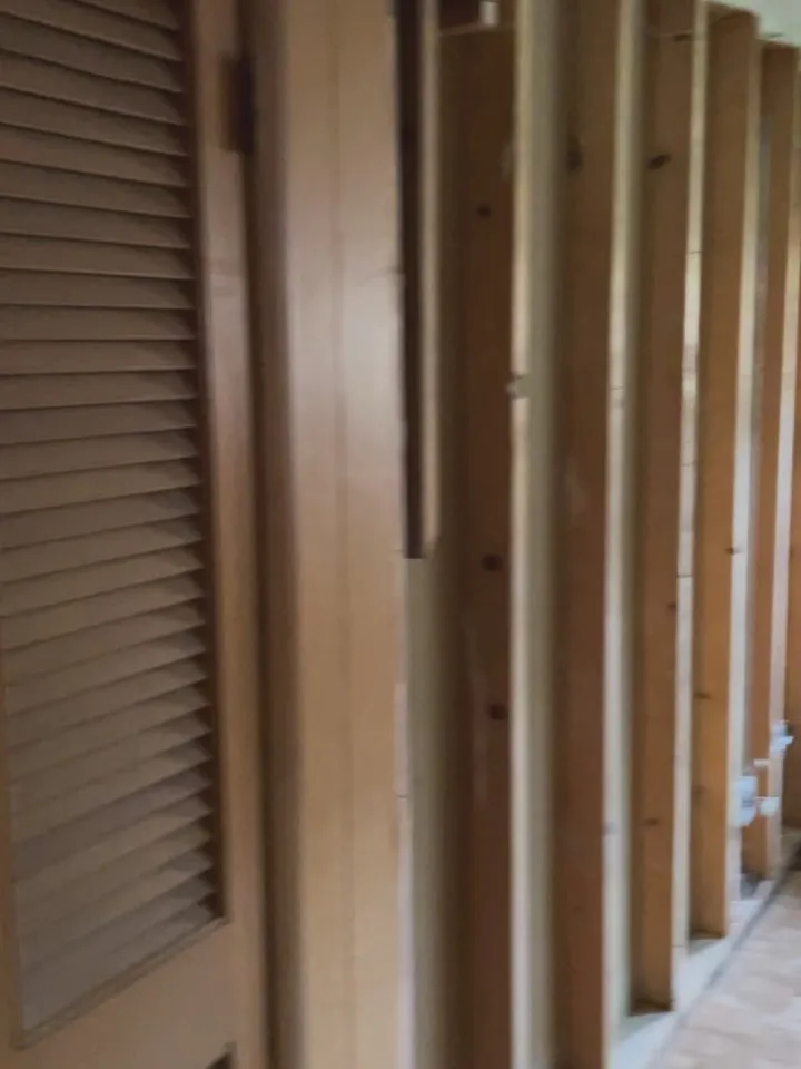 Wall framing exposed — clean structure before drywall