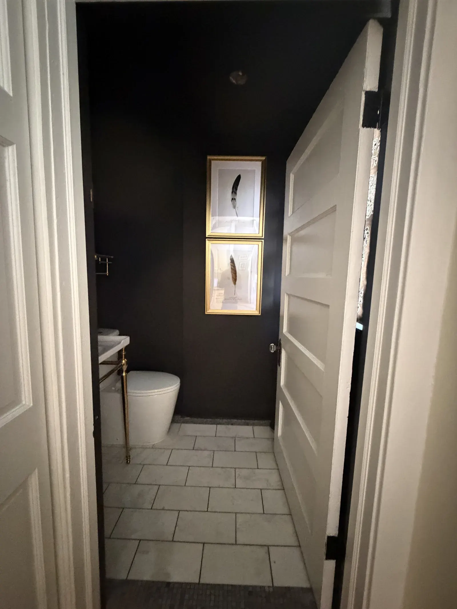 Powder room — full view from the hall