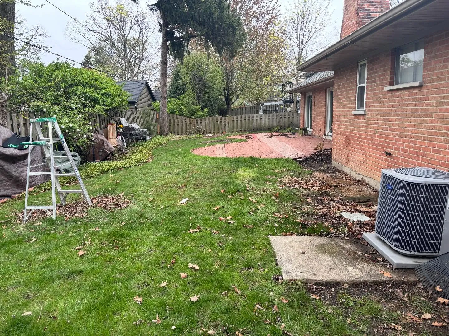 Backyard patio project — site before demo and regrading